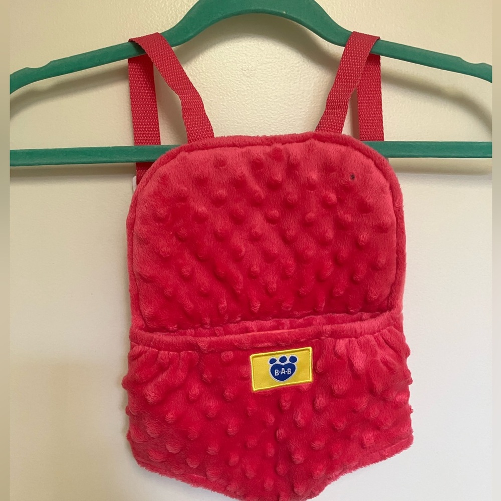 Pink fuzzy Build a Bear carrier
